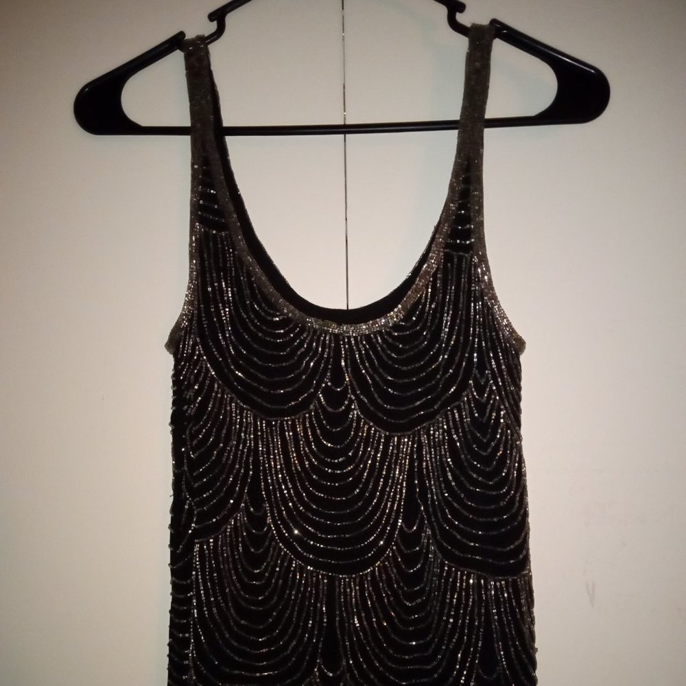 Black-size small, sleeveless, beautiful silver beaded design.